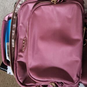 Tum Voyager Troy Pink Crossbody,  Excellent Condition